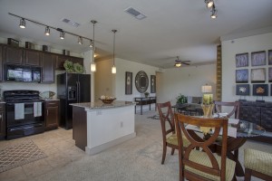 Three Bedroom Apartments for rent in San Antonio, TX - Model Living Room, Ktchen and Dining Room 